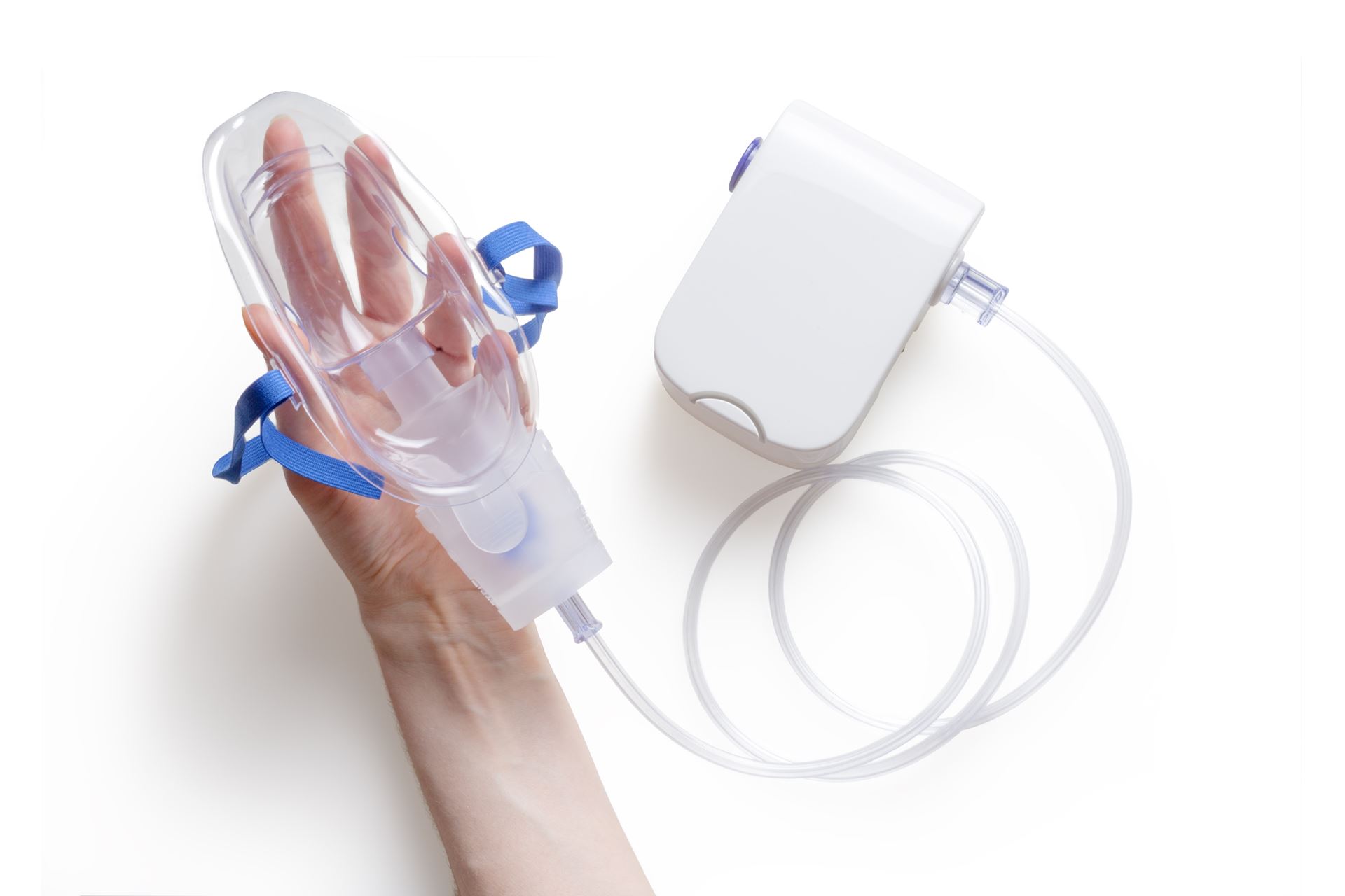 hand holding an oxygen mask